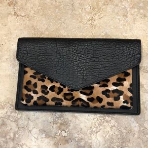Leopard and leather clutch